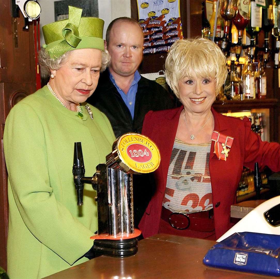 The Queen met Barbara Windsor inside the Queen Vic during her visit to Elstree Studios (Fiona Hanson/PA)