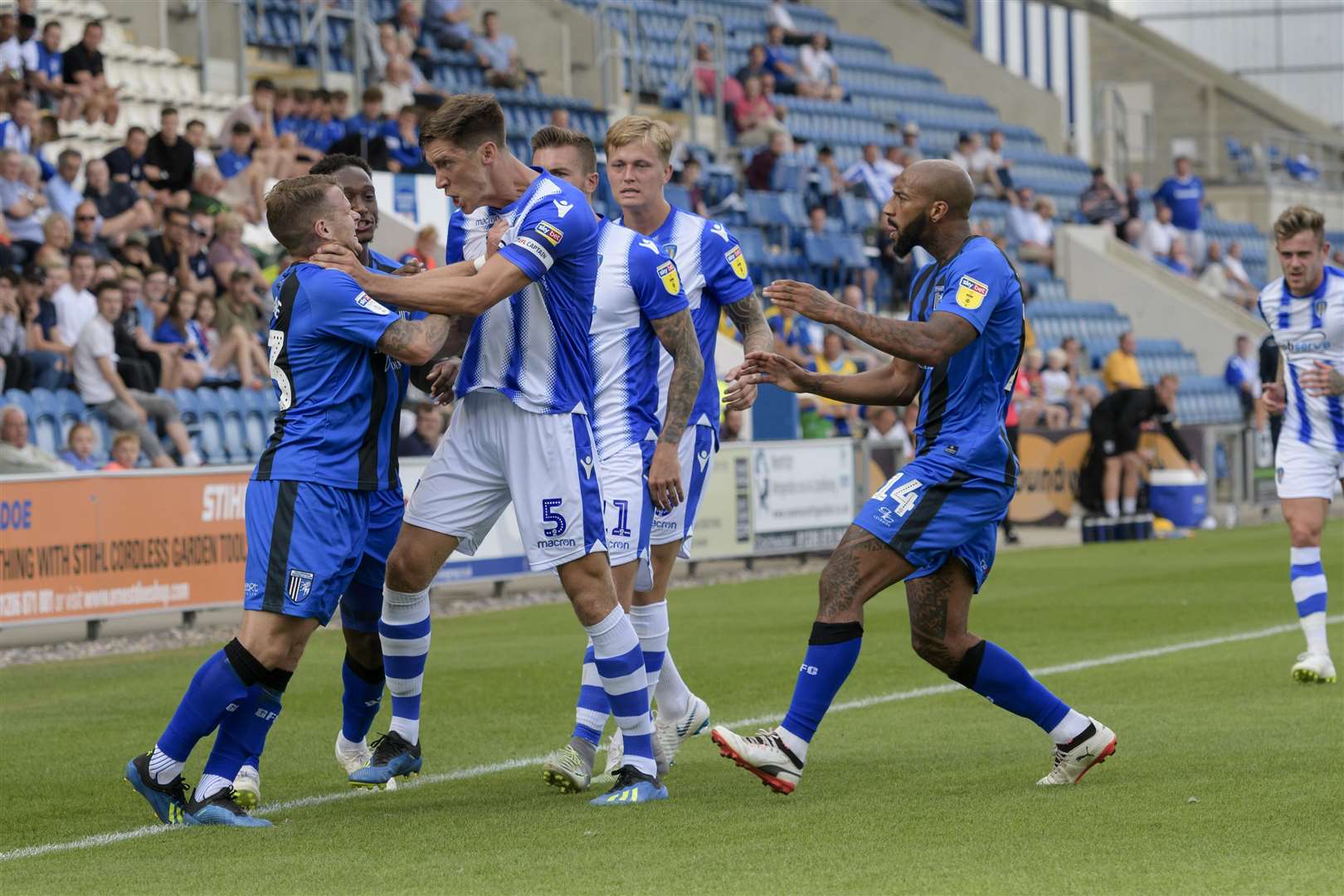 Mark Byrne and Colchester's Luke Prosser face off before the Gills man is sent off last weekend Picture: Andy Payton