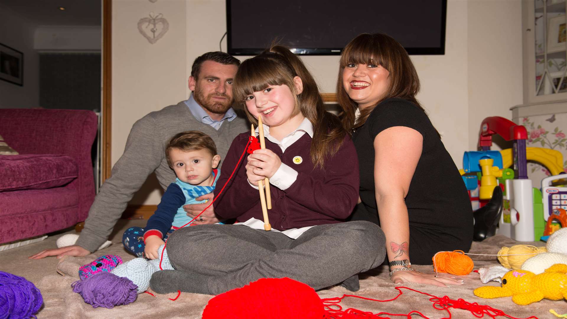 Charlotte-Mae with her family, including little brother, Eddie.