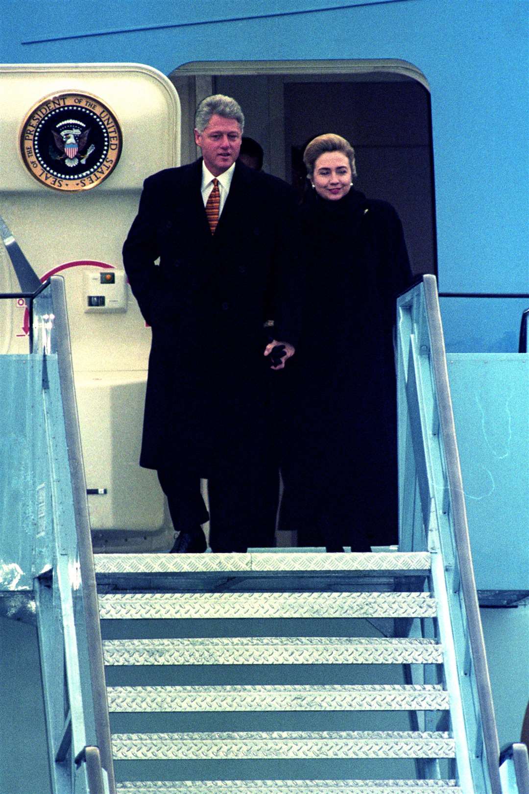 President Bill Clinton and first lady Hillary Clinton arrive in Belfast in the 1990s (PA)