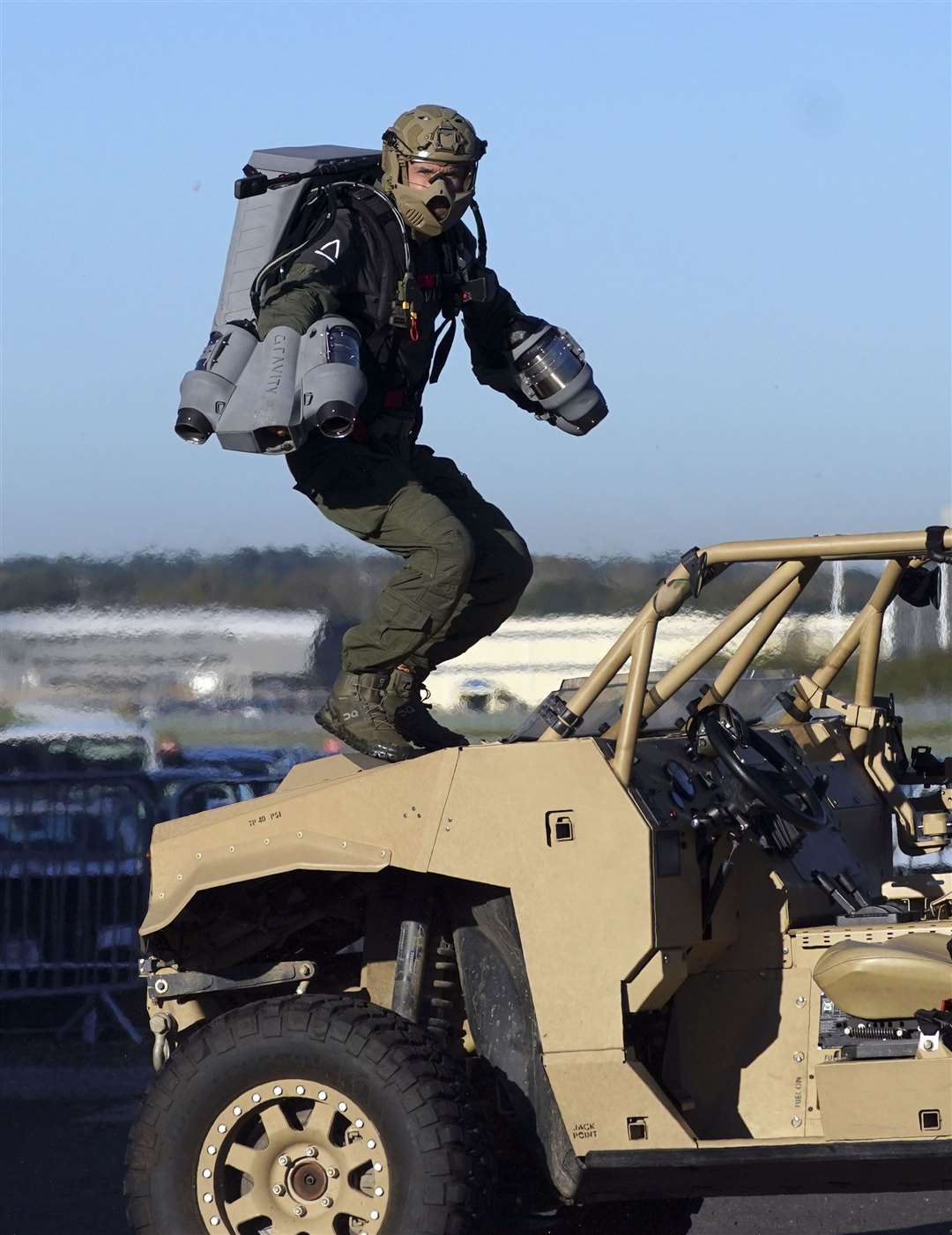 Jet Man lands on a vehicle (Steve Parsons/PA)