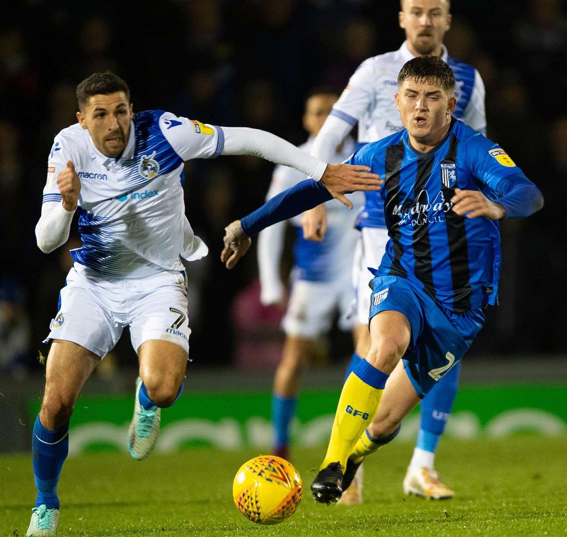 Darren Oldaker loses out in the race to the ball with Liam Sercombe Picture: Ady Kerry