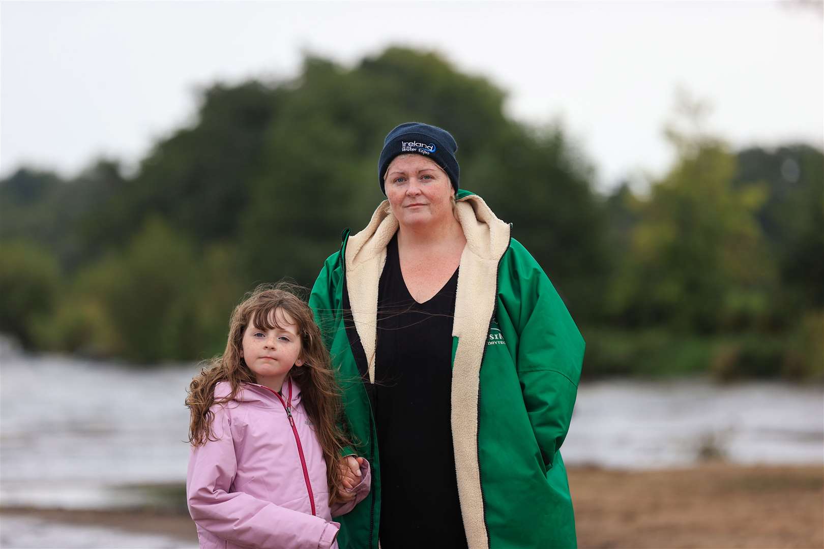 Mary O’Hagan, with her daughter Katie, says that the inability to use the lough for swimming has been devastating (Liam McBurney/PA)