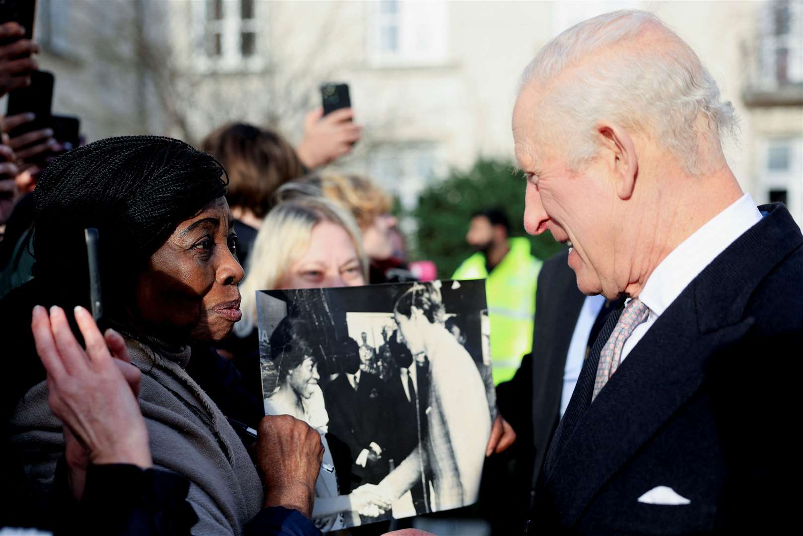 Caroline Akuffo showed Charles a photo of the pair meeting in Japan in 1970 (Mina Kim/PA)