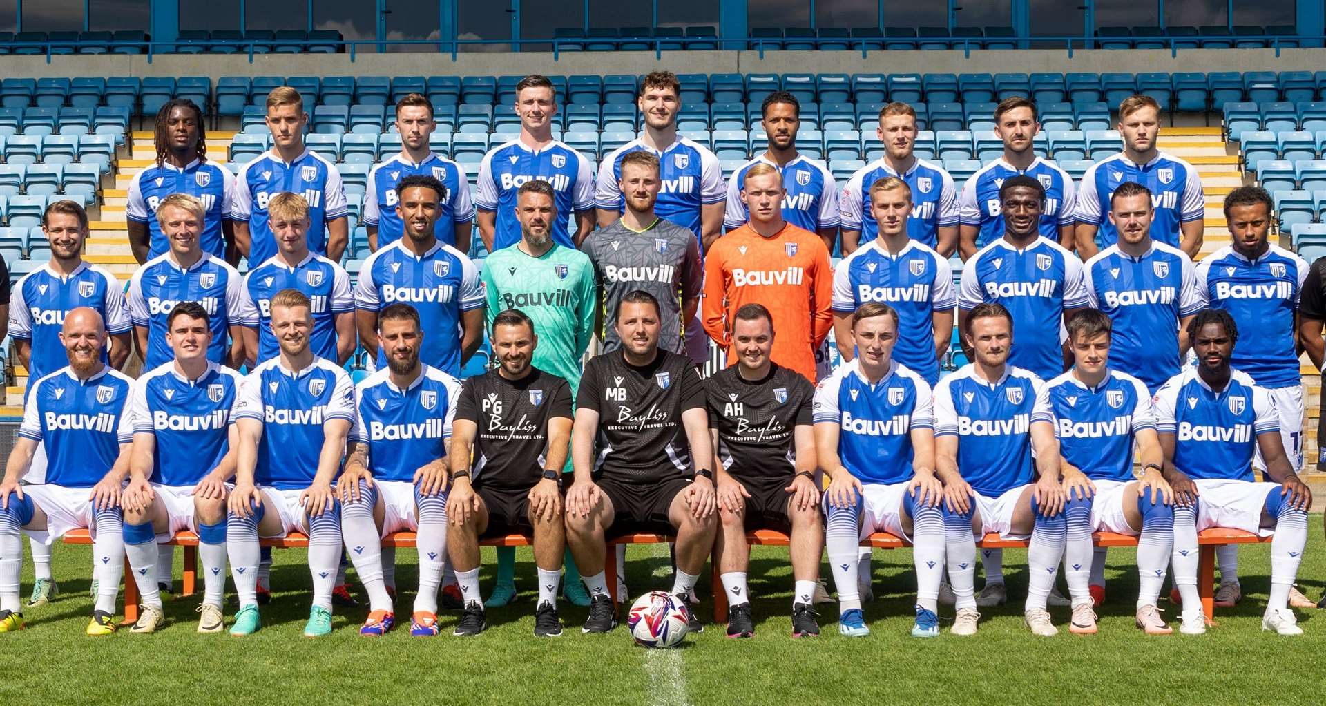 Gillingham’s 2024/25 squad. Back row, from left: Shad Ogie, Sam Gale, Conor Masterson, Oli Hawkins, Josh Andrews, Tim Dieng, Ethan Coleman, Robbie McKenzie, Elliott Nevitt. Middle row: Euan Williams, George Lapslie, Joshua Bayliss, Remeao Hutton, GlennMorris, Jake Turner, Taite Holtam, Alex Giles, Joe Gbode, Jack Nolan, Jayden Clarke. Front row: Jonny Williams, Marcus Wyllie, Max Clark, Max Ehmer, Pete Gill (First-Team Coach), Mark Bonner (First-Team Manager), Anthony Hayes (Assistant Manager), Stanley Skipper, Armani Little, Jacob Wakeling, Aaron Rowe. Picture: KPI/Gillingham FC