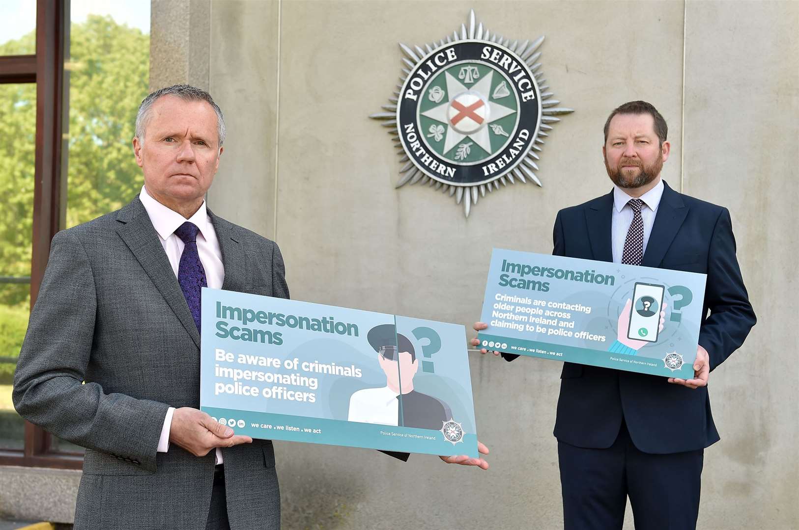 Northern Ireland Older People’s Commissioner Eddie Lynch (right) and Chief Inspector Ian Wilson at a press conference where they warned about a rise in fraudsters posing as police officers targeting older people (PSNI/PA)