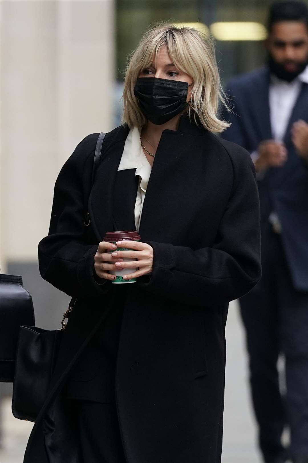 Sienna Miller outside court earlier on Wednesday (PA)