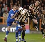 Gillingham midfielder Barry Cogan gets stuck in. Picture: MATTHEW WALKER