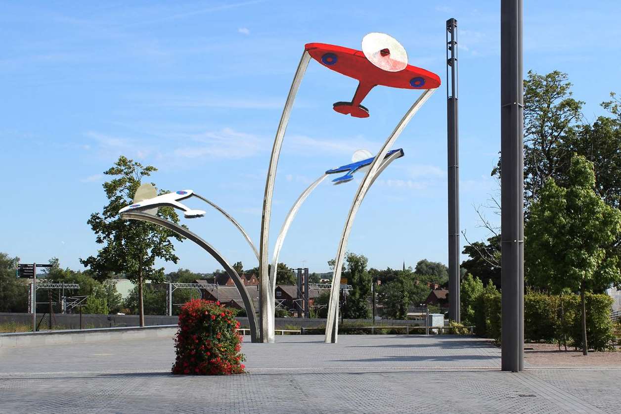 Red, white and blue Spitfires overlooking Ashford's former airfields