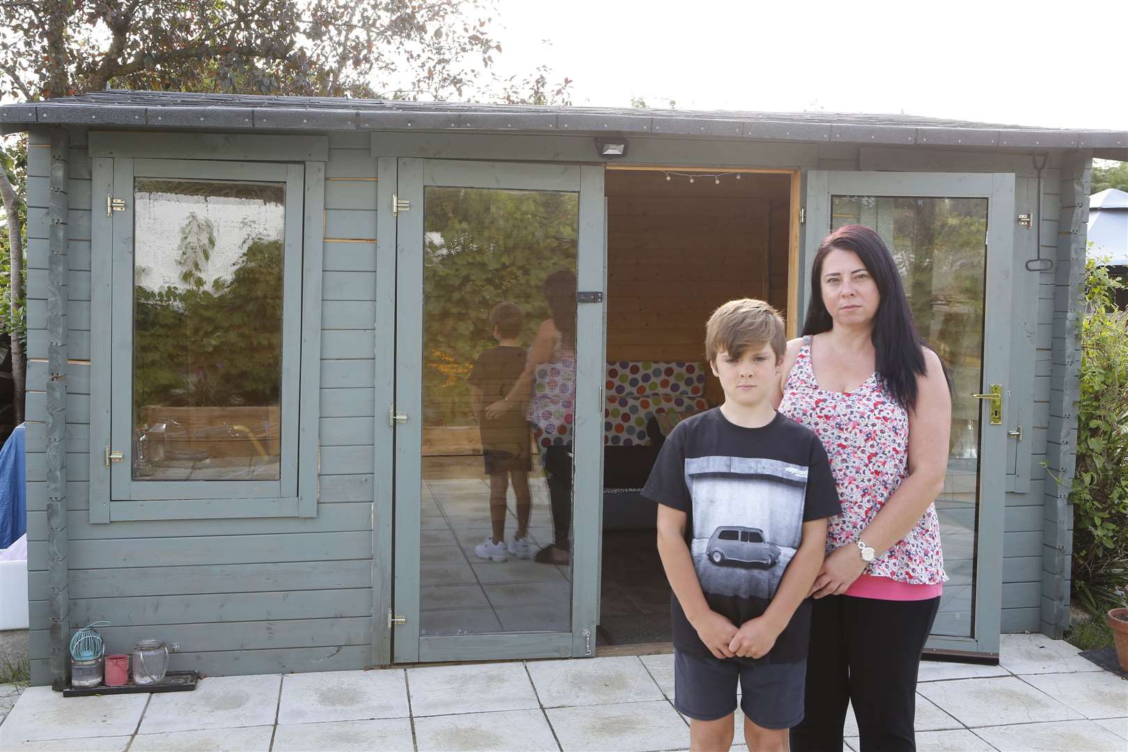 Caroline Martin with son Loris outside their cabin Picture: Andy Jones