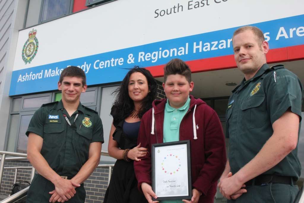 Folkestone teen Josh Anslow with mum Zyel Abraham and South East Coast Ambulance paramedics Nathan Jeffrey (left) and Simon Wilks