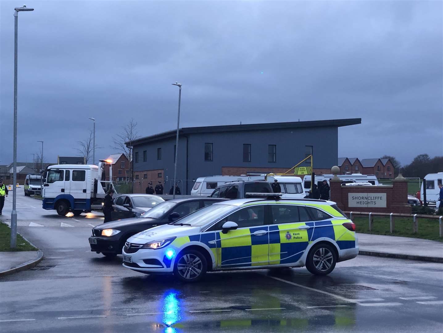 Police and council officers attended the site in a bid to move the group from Shorncliffe Heights; the group left on Monday