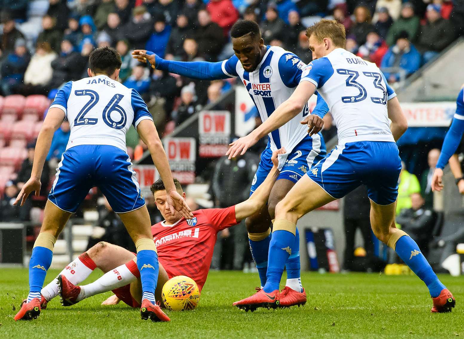 Callum Reilly crowded out at Wigan Picture: Andy Payton