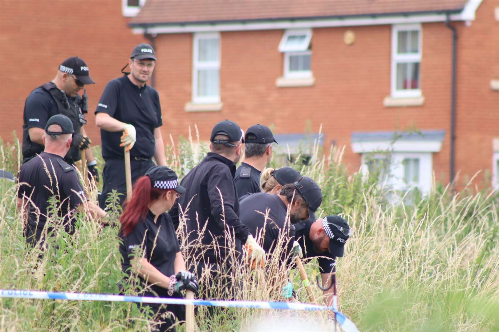 Police carrying out a search in Sittingbourne after a teenage girl was stabbed. Picture: John Nurden