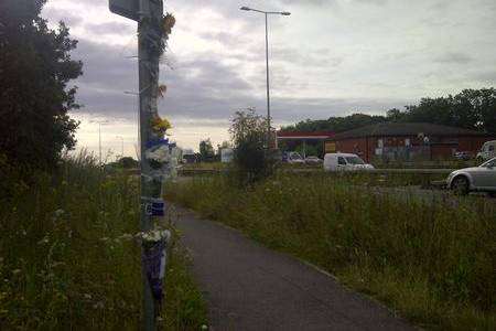 Flowers at the scene where Graham Epps, 29, was hit by a car on the A2 at Boughton