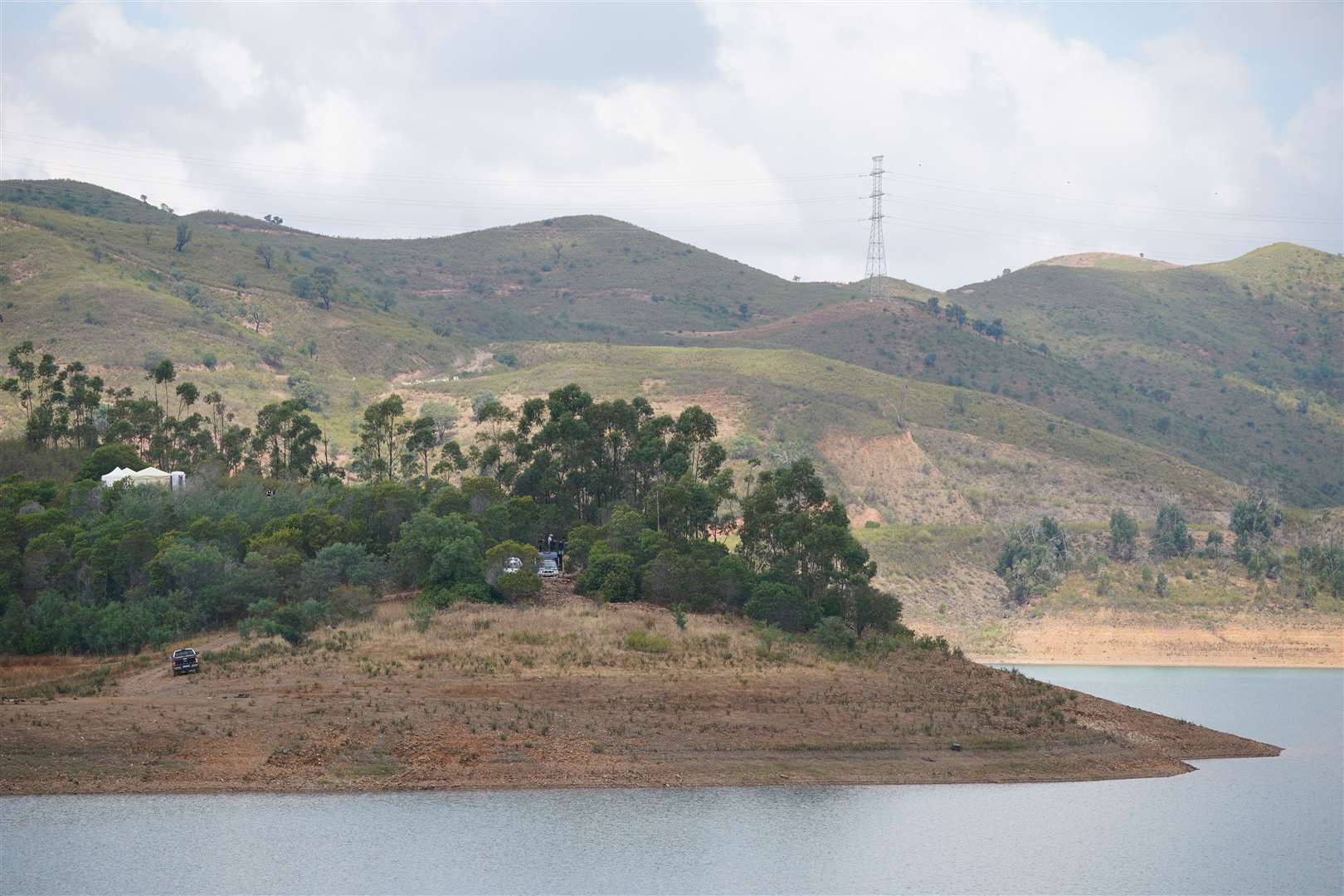 The searches are taking place in and near a remote reservoir around 30 miles from where Madeleine disappeared in 2007 (Yui Mok/PA)