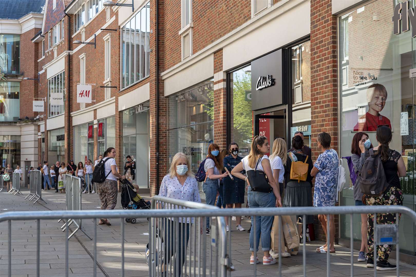 Queues in Whitefriars, Canterbury, as shops reopened following the coronavirus lockdown. Picture: Jo Court