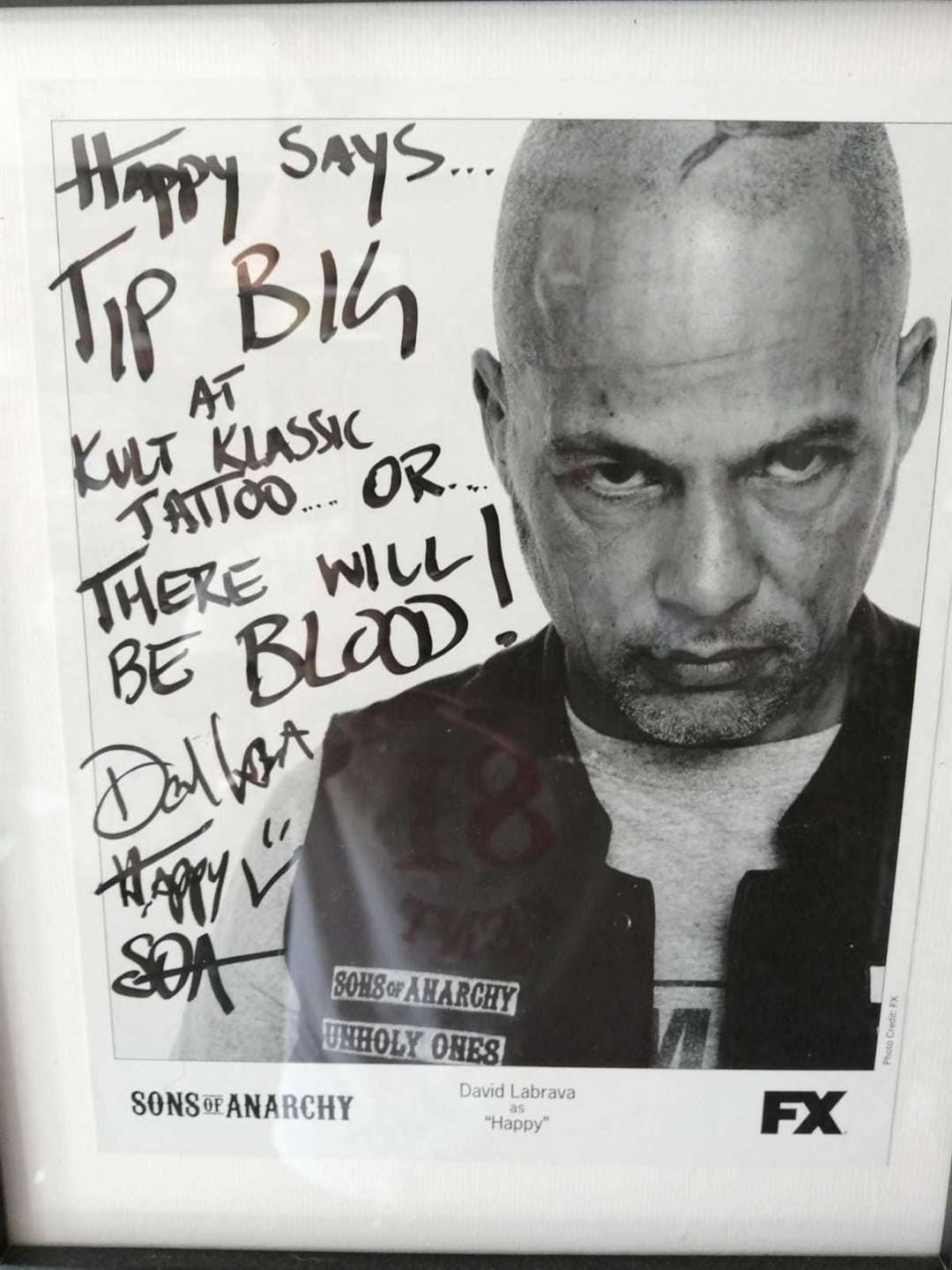 A signed photo of previous Kult Klassic Tattoo Studio customer David Labrava from the TV series Sons of Anarchy