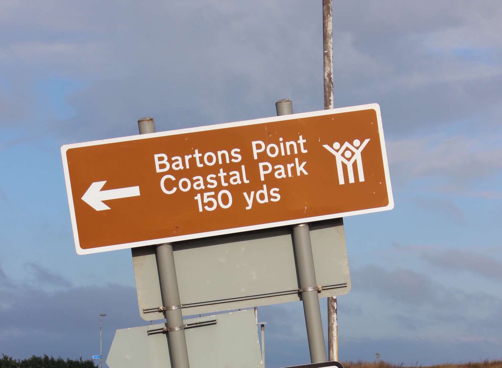 One of few brown tourist signs on Sheppey