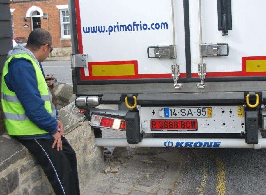 The lorries have been clipping a wall