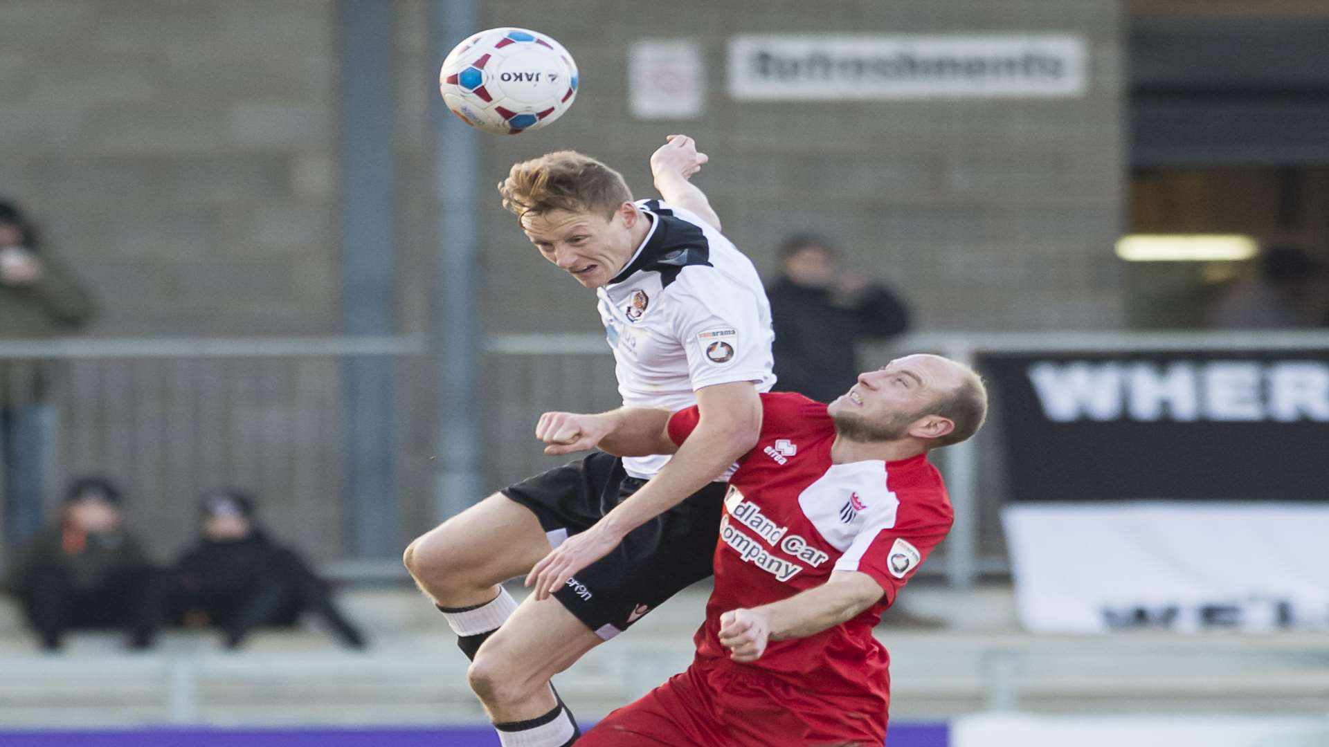 Callum McNaughton climbs highest to win this header against Bath City Picture: Andy Payton