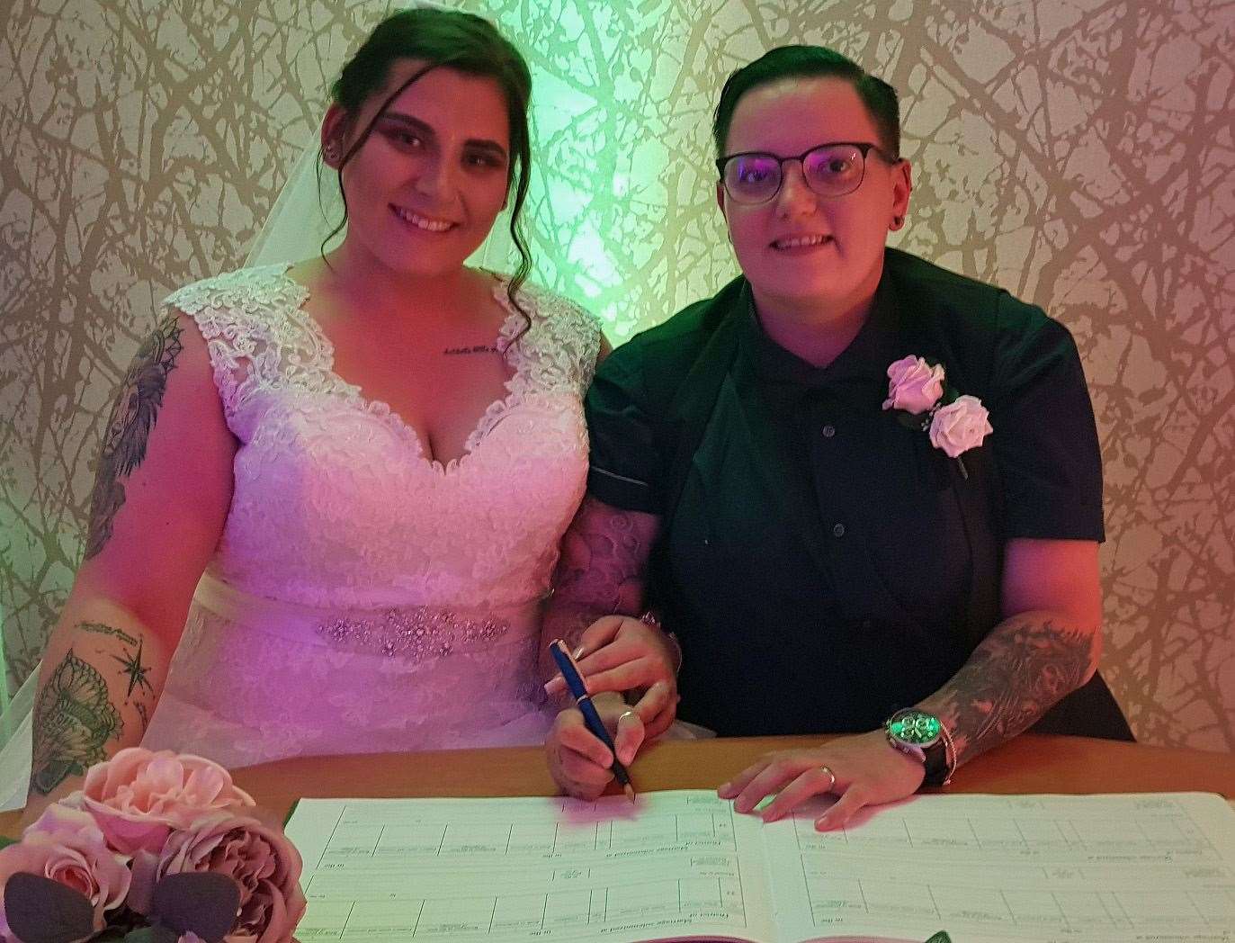 Louise Arnold-Wilson (right) and Jennifer (left) were married at Runcorn Town Hall Registry Office at one minute past midnight (Halton Borough Council/PA)