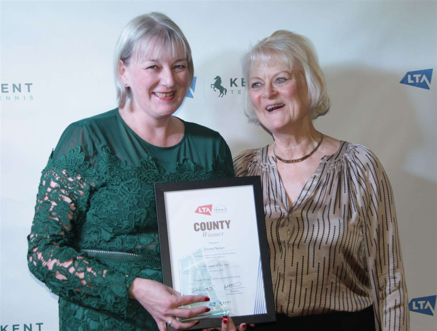 Volunteer of the year Emma Nelson of Oakwood Tennis Club with Mary Evans