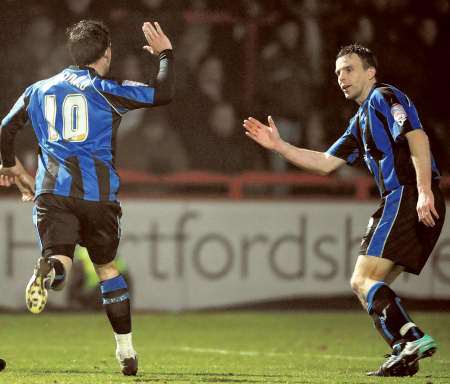 Cody McDonald celebrates his goal with Mark Bentley