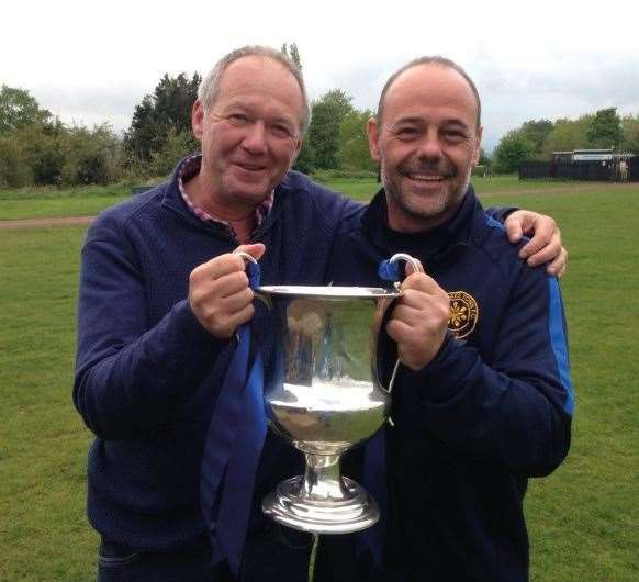 Micky Collins, right, with chairman Paul Lansdale after Sevenoaks' Southern Counties East title success