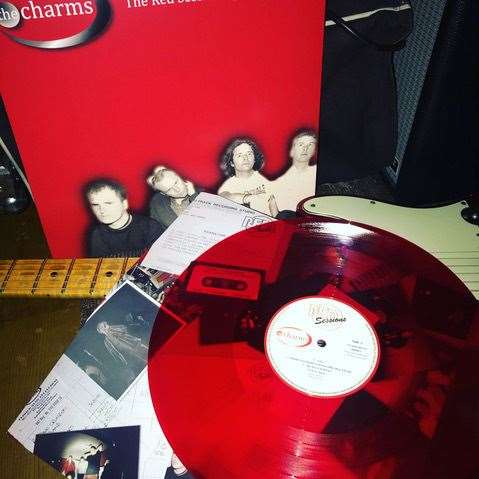 The release is on red translucent vinyl