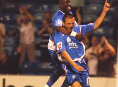 CRACKER: Gillingham's Clint Easton celebrates his goal with Ian Cox. Picture: BARRY GOODWIN