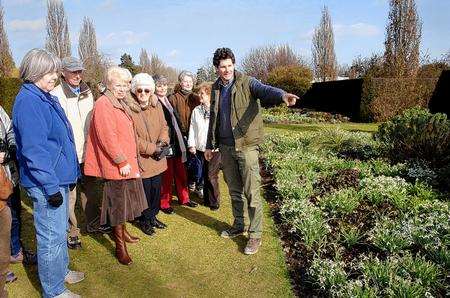 Hadlow College head gardener Alex Rennie shows visitors around the gardens during the Hellebore Open Days. Picture by Matthew Walker