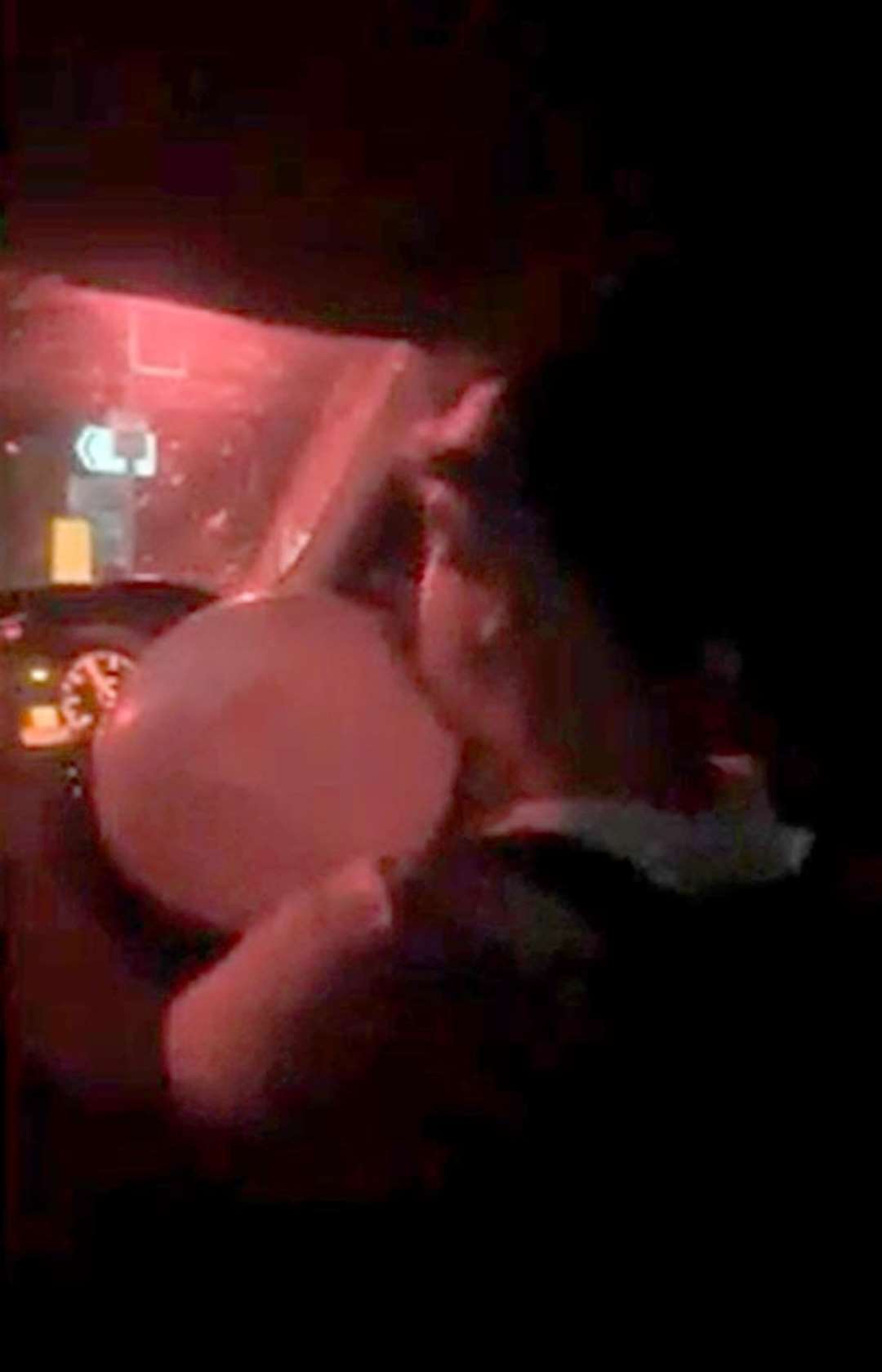 A screengrab of Thomas Johnson with a balloon in his mouth, inhaling nitrous oxide from a video filmed before the crash (Thames Valley Police/PA)