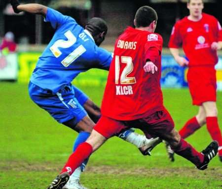 Dennis Oli fires in Gillingham's second goal. Picture: Matthew Reading.