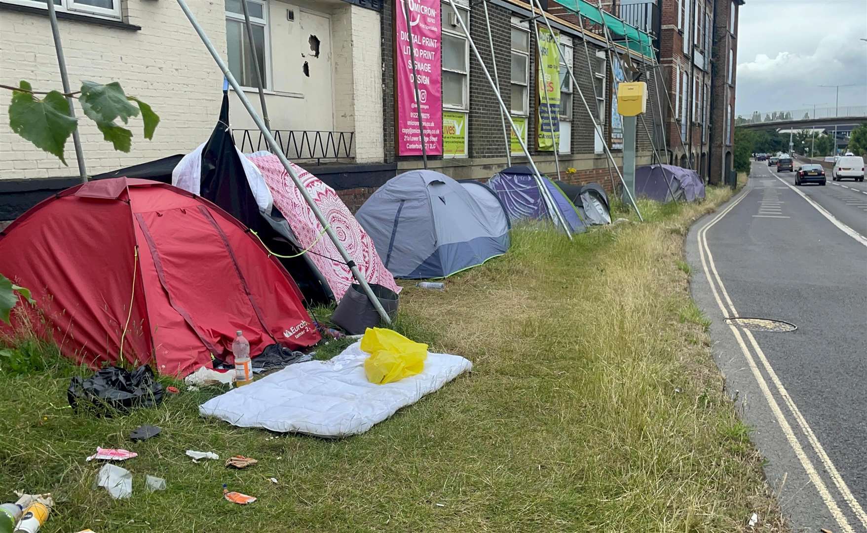 Some of the rough sleepers’ tents along Canterbury’s ring-road as perilously close to the busy dual carriageway