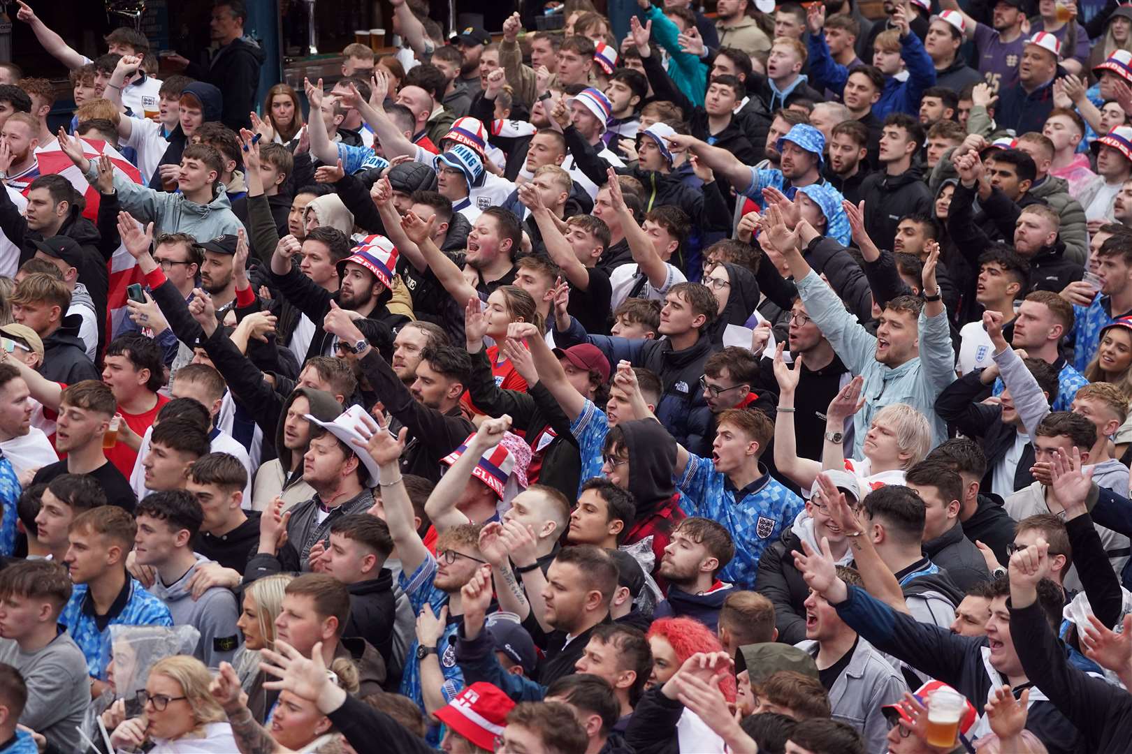 Three Lions fans cheered on England against Serbia from pubs and fan zones across the country (Owen Humphreys/PA)