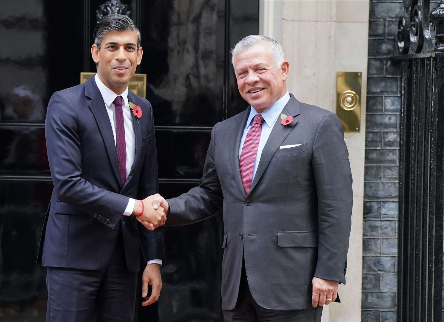 Prime Minister Rishi Sunak shakes hands with King Abdullah II of Jordan outside 10 Downing Street after their meeting (Jonathan Brady/PA)