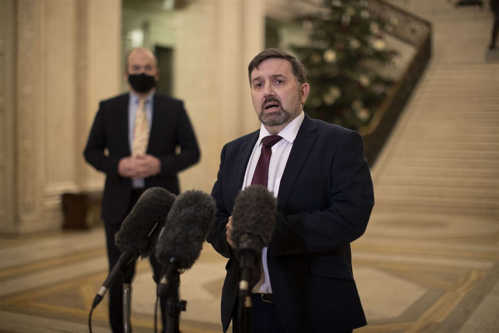 Northern Ireland Health Minister Robin Swann (right) with Dr Michael McBride, the chief medical officer (CMO) for Northern Ireland (PA) (Liam McBurney/PA)