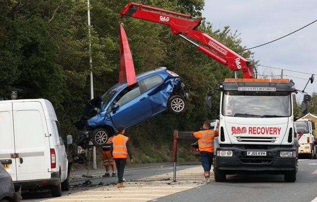 One of the damgaged cars being taken away. Picture: UKNiP