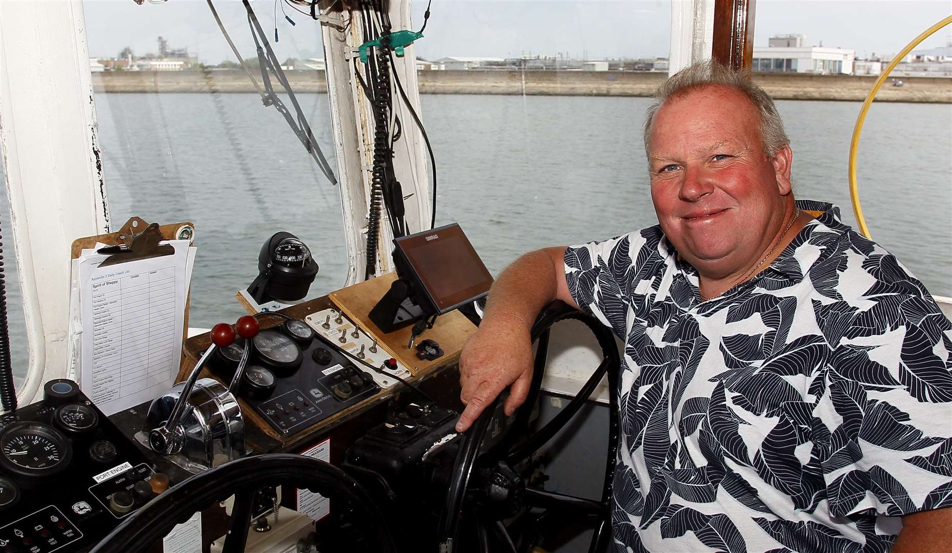 Dave Wilcock in the wheelhouse of the Spirit of Sheppey in Queenborough. Picture: Sean Aidan