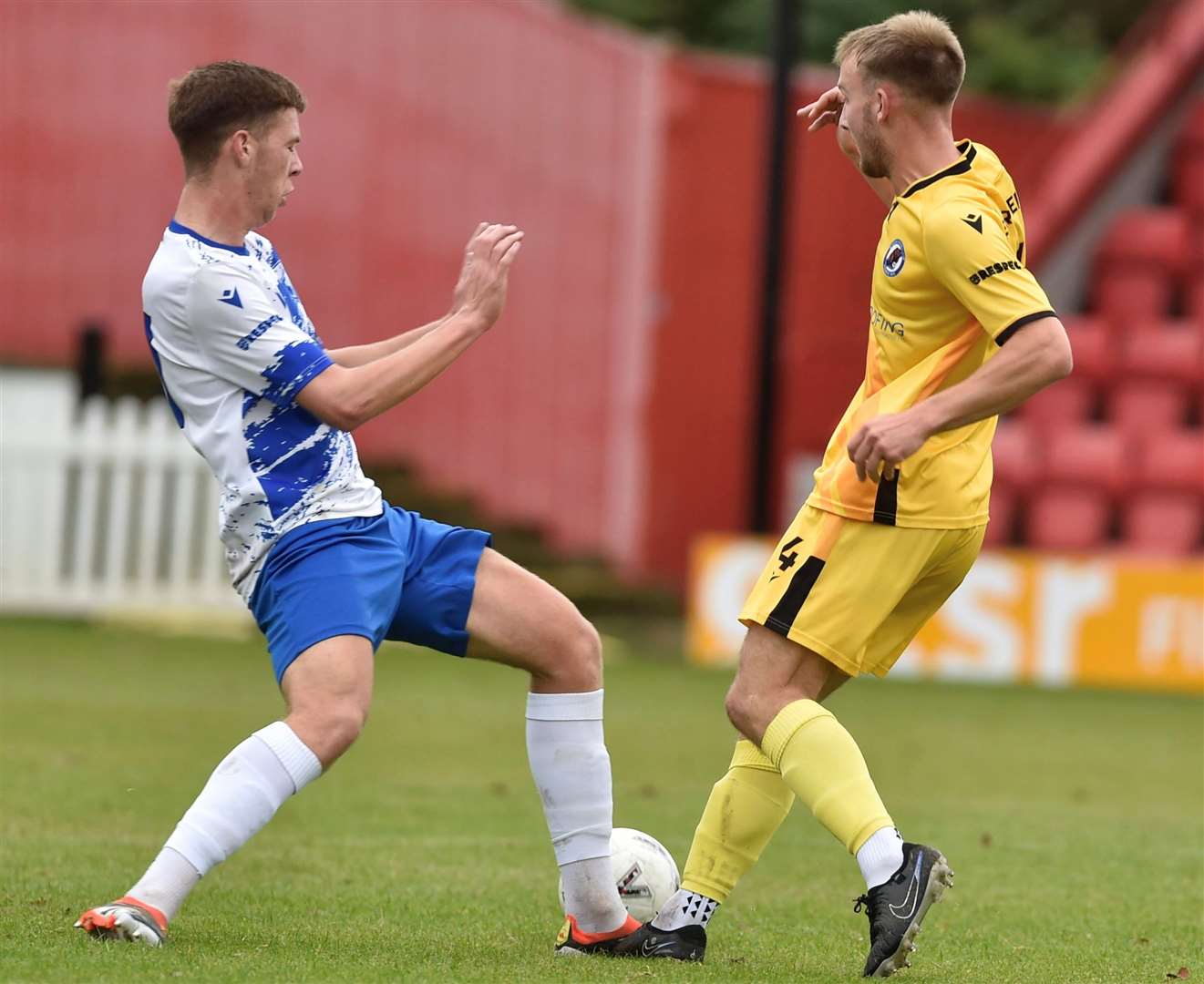 Erith & Belvedere and Bearsted (yellow) battle for the ball in midfield. Picture: Ian Scammell