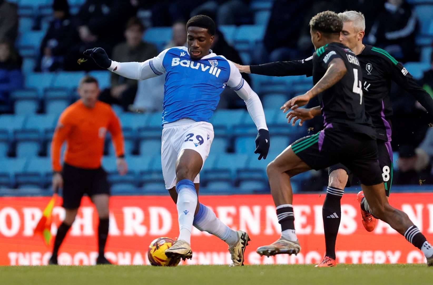 Joe Gbode in action for Gillingham against Salford City Picture: @Julian_KPI