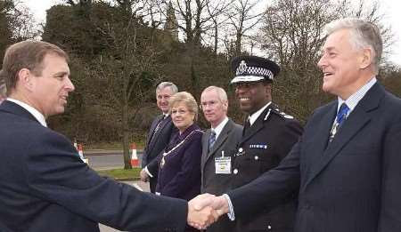 The Duke is greeted by Edwin Boorman, chairman of the KM Group, on his arrival at the company's HQ