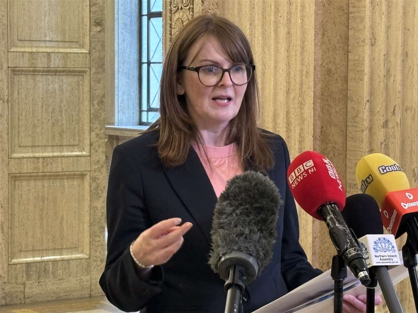 Stormont Finance Minister Caoimhe Archibald speaks to media in the Great Hall in Stormont after meeting with representatives from the Mid South West region, and Causeway Coast and Glens city and growth deals at Parliament Buildings (Rebecca Black/PA)