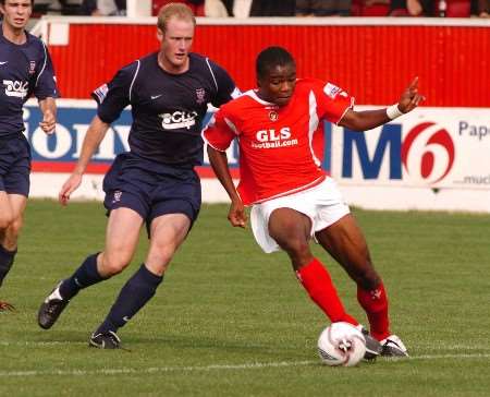 Onome Sodje gets away from the York defender before scoring Gravesend's late equaliser. Picture: STEVE CRISPE