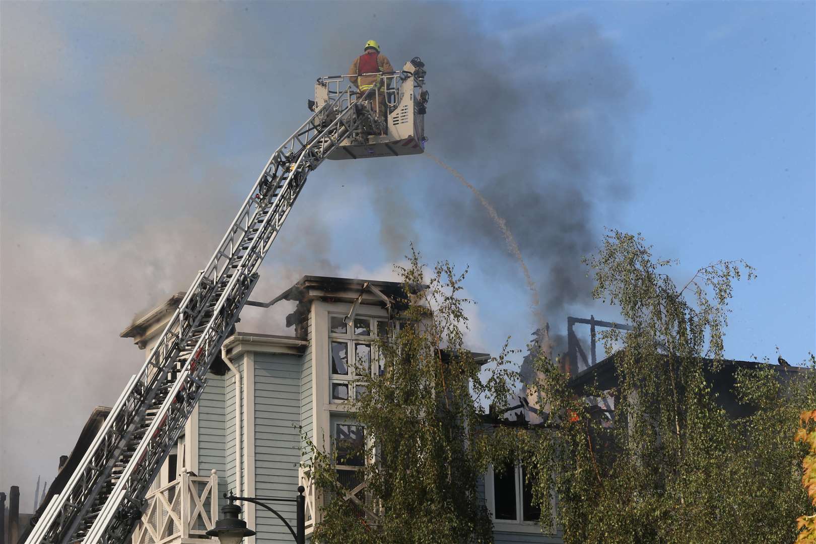 Firefighters tackle the blaze at Holborough Lakes. Picture: John Westhrop