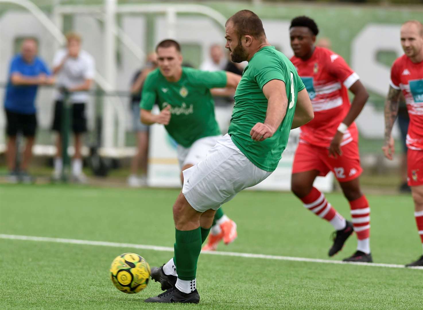 Returning Ashford forward Gary Lockyer opens his account for the season from the penalty spot against Egham Town. Picture: Ian Scammell