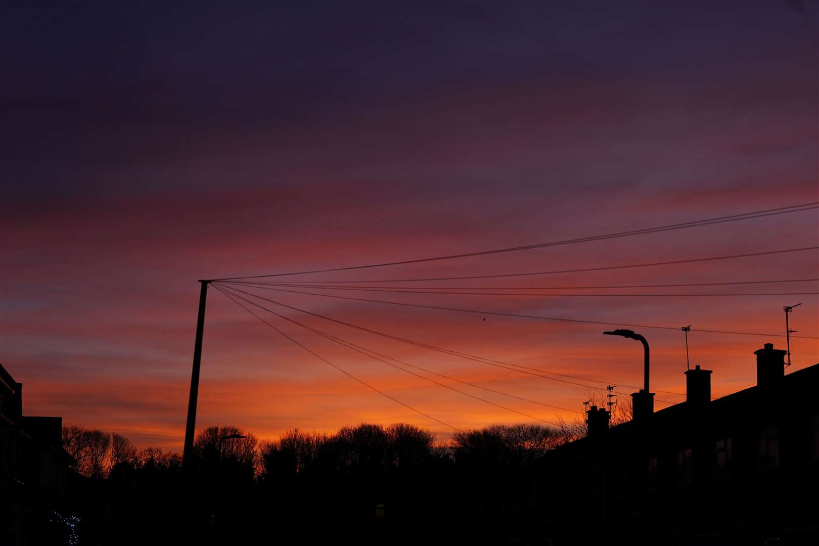 The sun sets over Liverpool on Christmas Eve (Peter Byrne/PA)