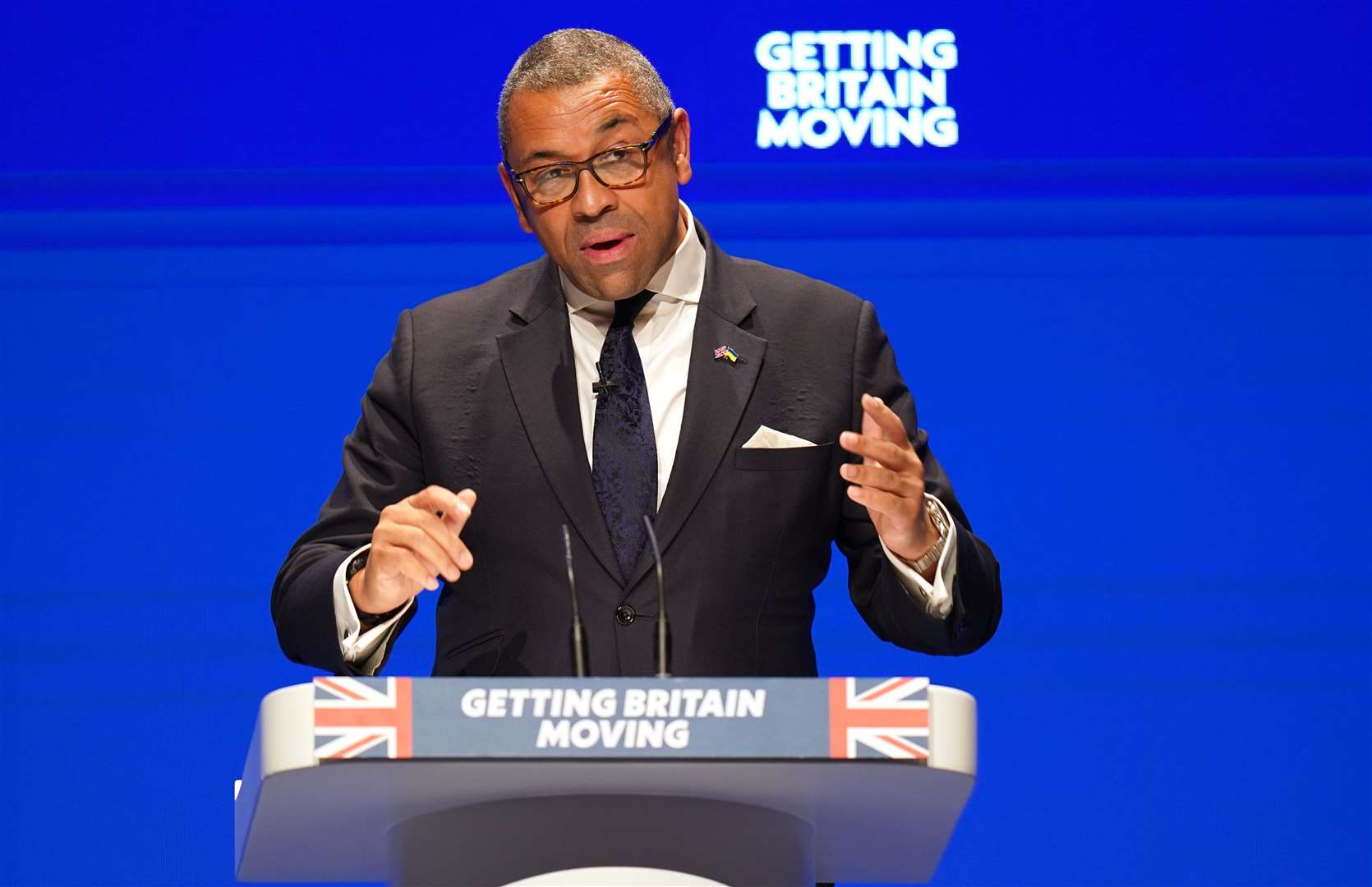 Foreign Secretary James Cleverly speaks at the Conservative Party conference in Birmingham (Jacob King/PA)