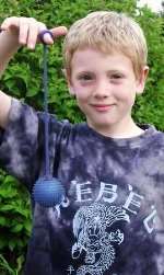Matthew Warren, 7, with his Yo-ball